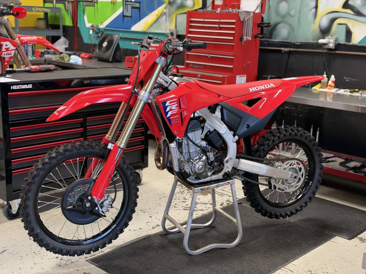 Stock 2026 Honda CRF450R on a stand in the workshop before the CRF's Only project build